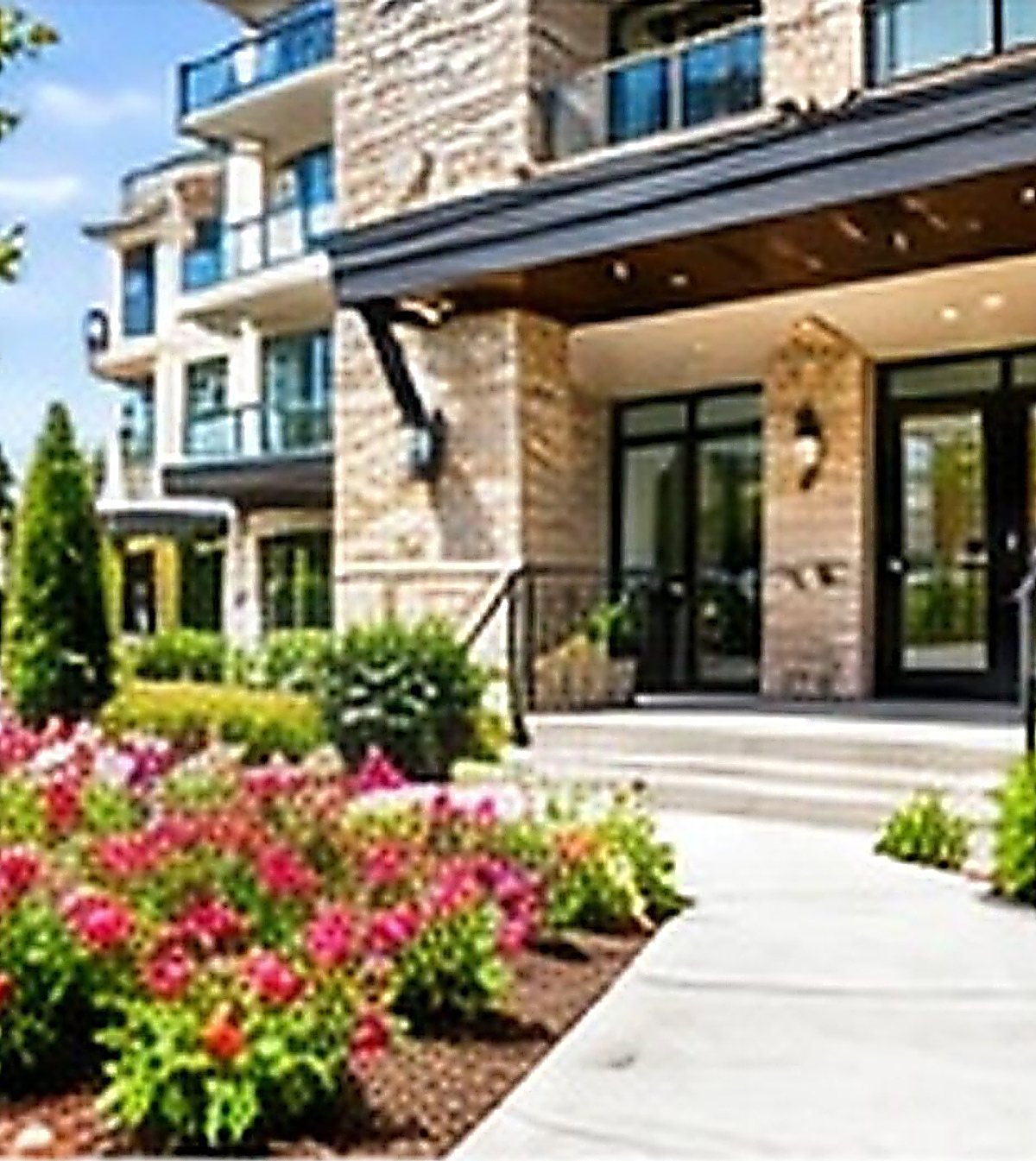 Landscaped entrance to a residential building